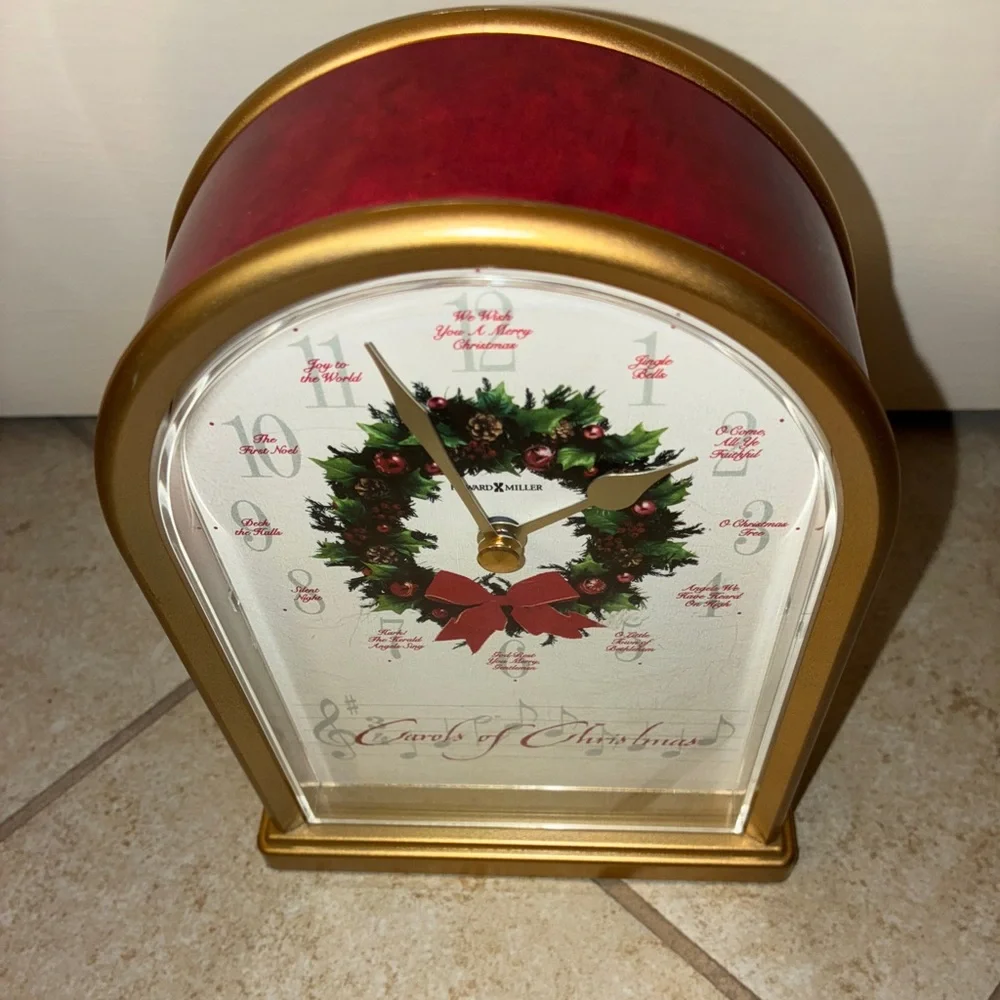 Red and Gold Christmas Howard Miller Clock.  Listen to video.